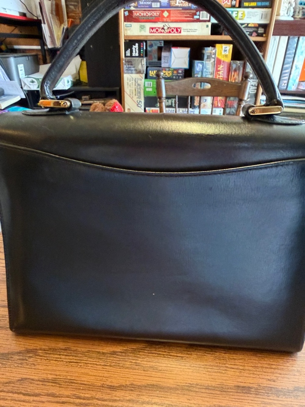Vintage Bally black leather handbag with gold-tone turn-lock closure. - Picture 13 of 14